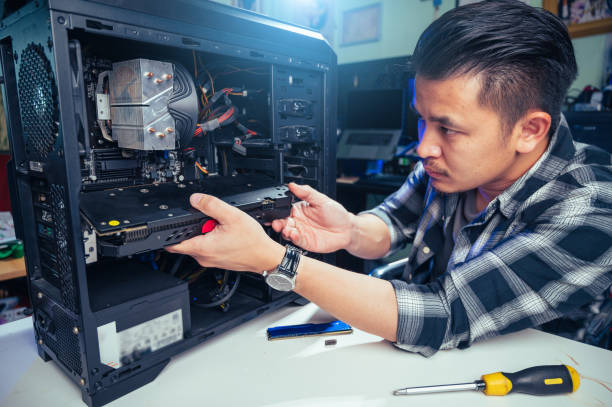 Computer technician repairing hardware